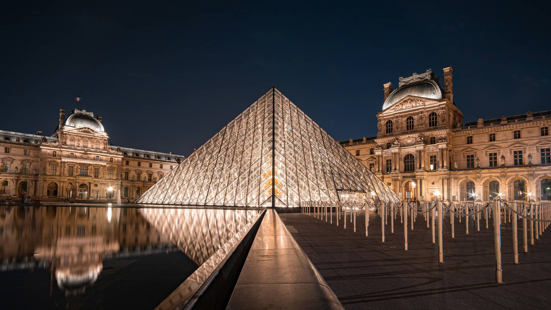 The majestic pyramid outside Louvre
